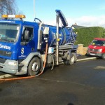 Blue Contract Services truck with small red van Drain Cleaning Contract Services in Northern Ireland