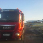 Contract Services truck with airplane in the background Contract Services Drain Cleaning in Northern Ireland